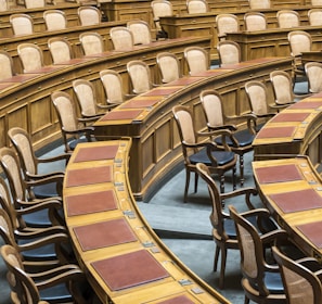 brown wooden chairs on blue and brown wooden floor