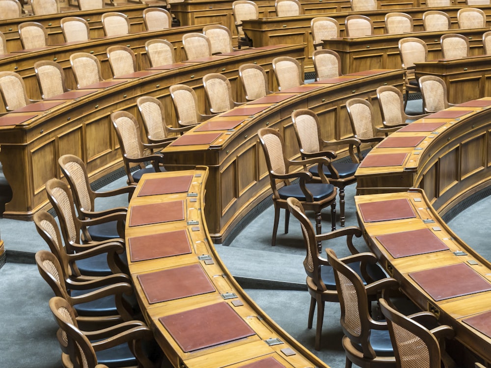 brown wooden chairs on blue and brown wooden floor