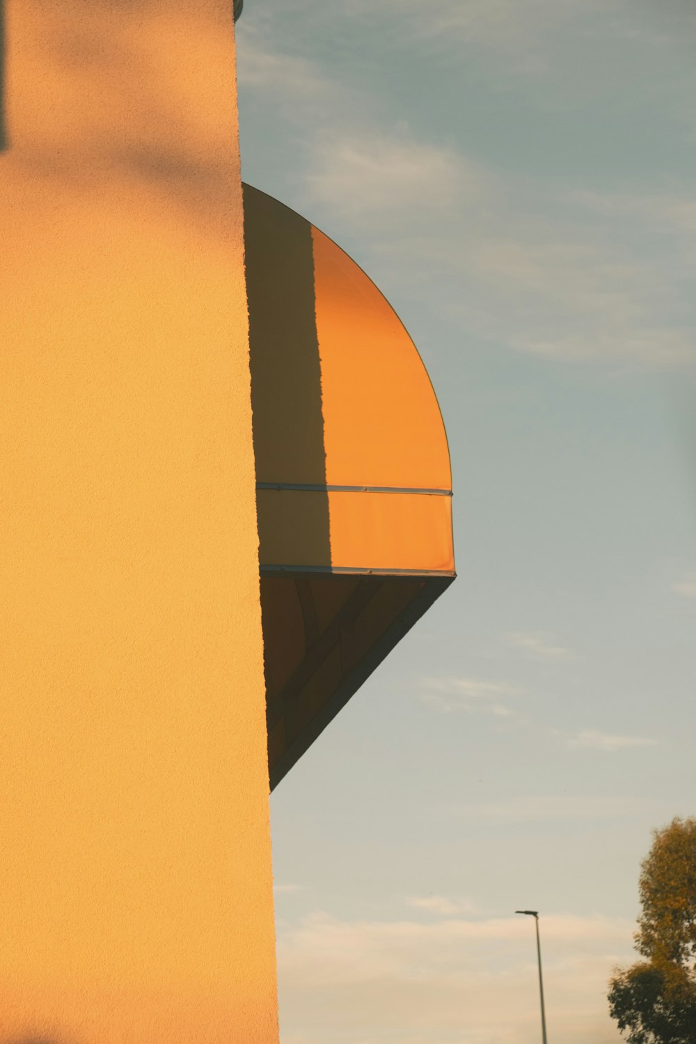 yellow concrete building under blue sky during daytime