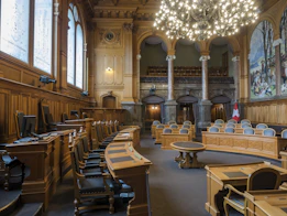 brown wooden chairs inside building
