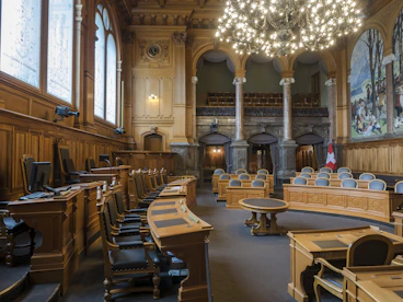 brown wooden chairs inside building