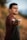 man in brown sweater holding black smartphone