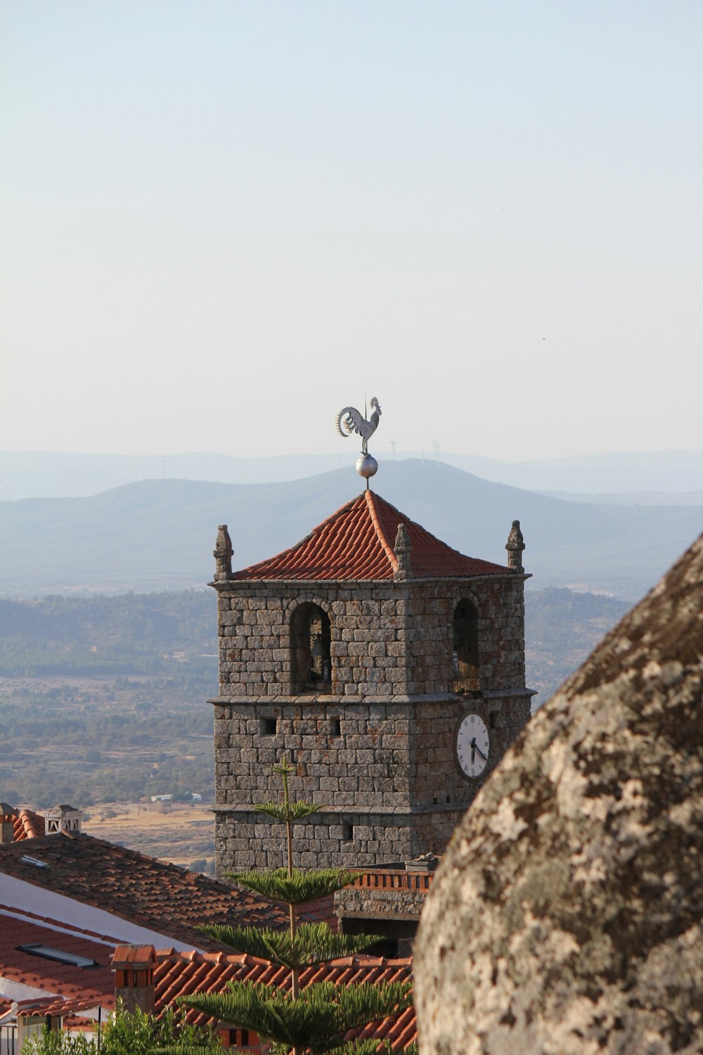 brown and gray concrete church near body of water during daytime