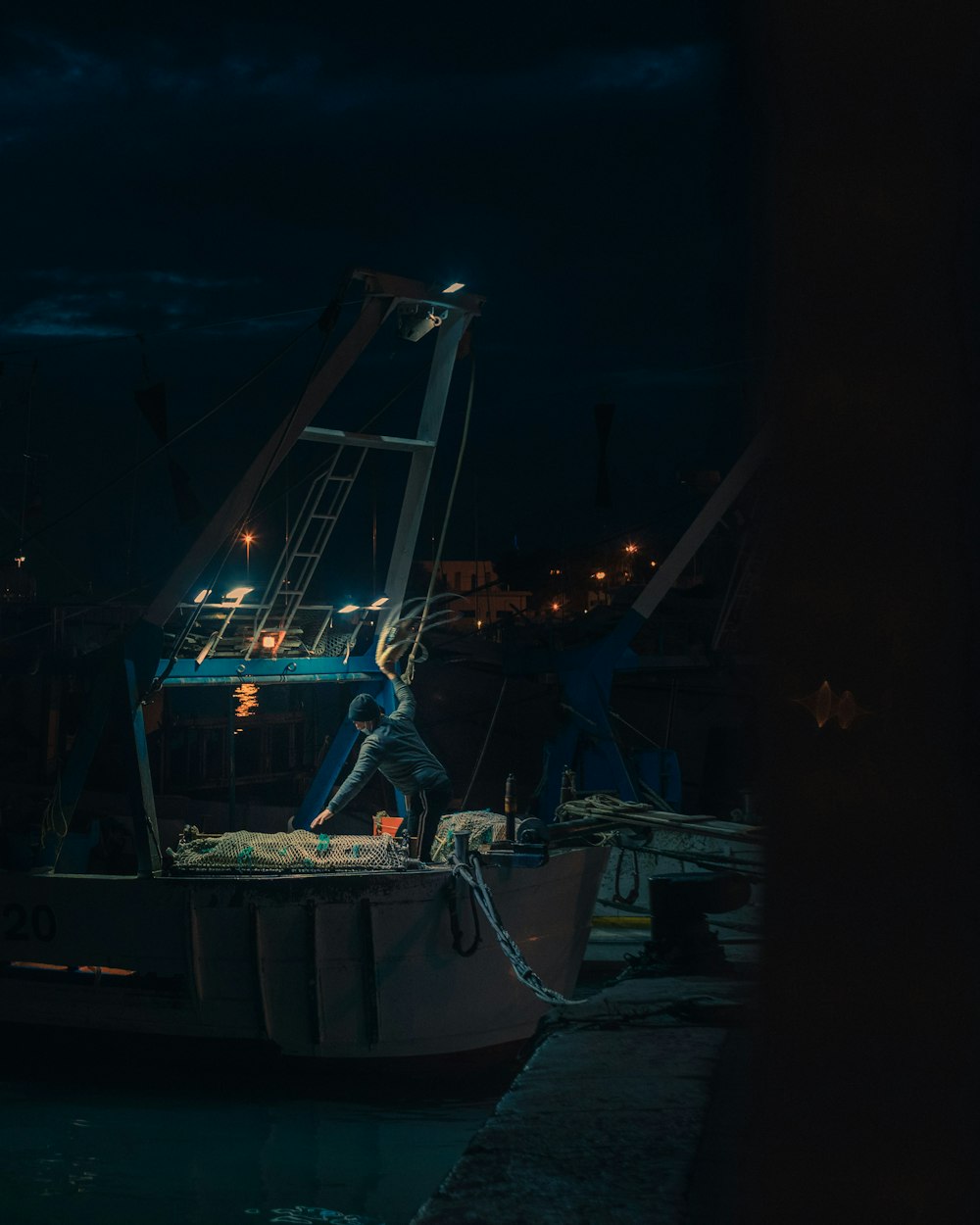 blue and orange crane during night time