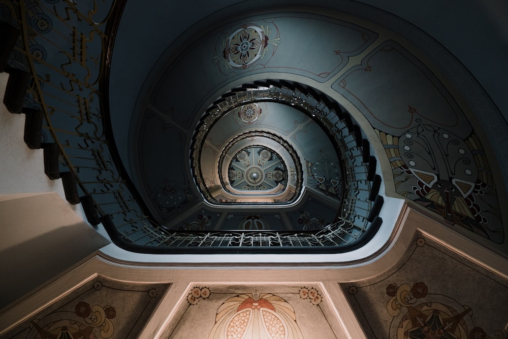 low angle photography of spiral staircase