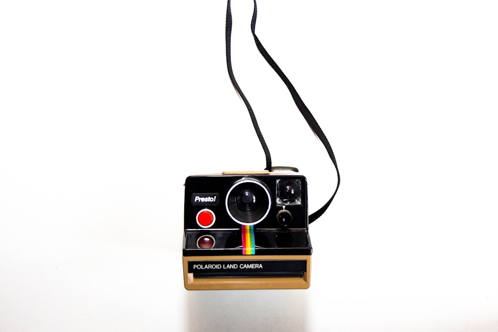 Brown and black polaroid camera photo – Free Assen Image on Unsplash