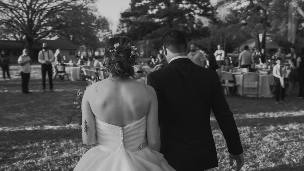 grayscale photo of bride and groom