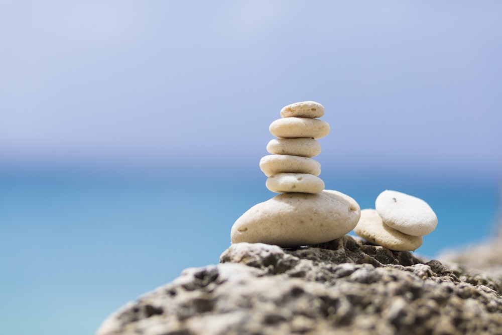 stack of stones on gray rock