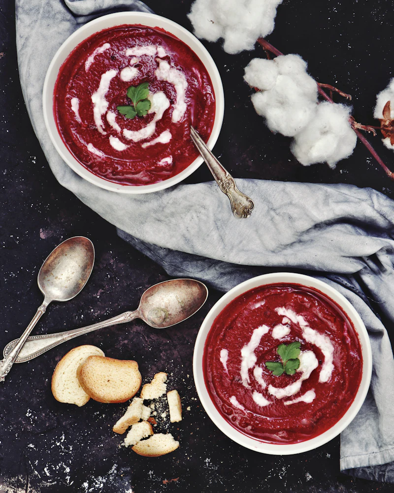 Bright pink Latvian cold beet and kefir soup in a bowl