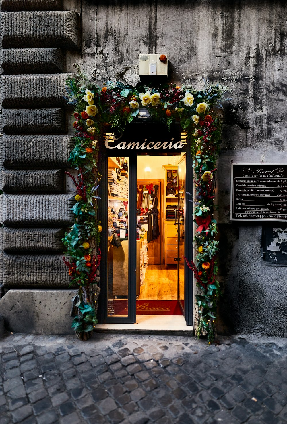 brown wooden door with green vines