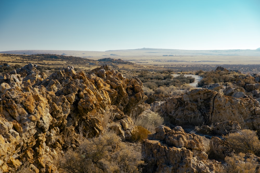 brown rocky mountain under blue sky during daytime