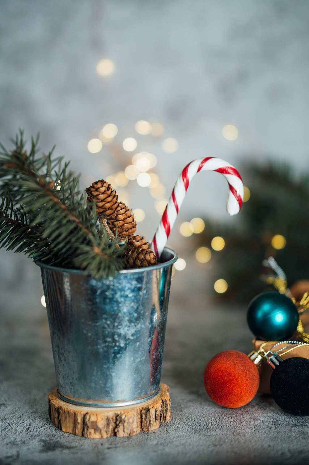 red and white candy cane on stainless steel cup