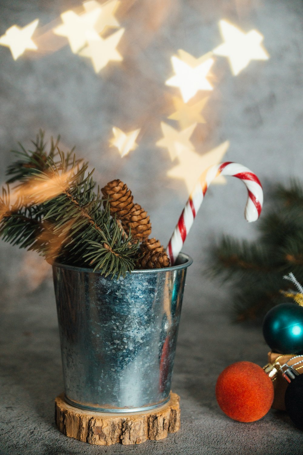 brown pine cone in stainless steel cup