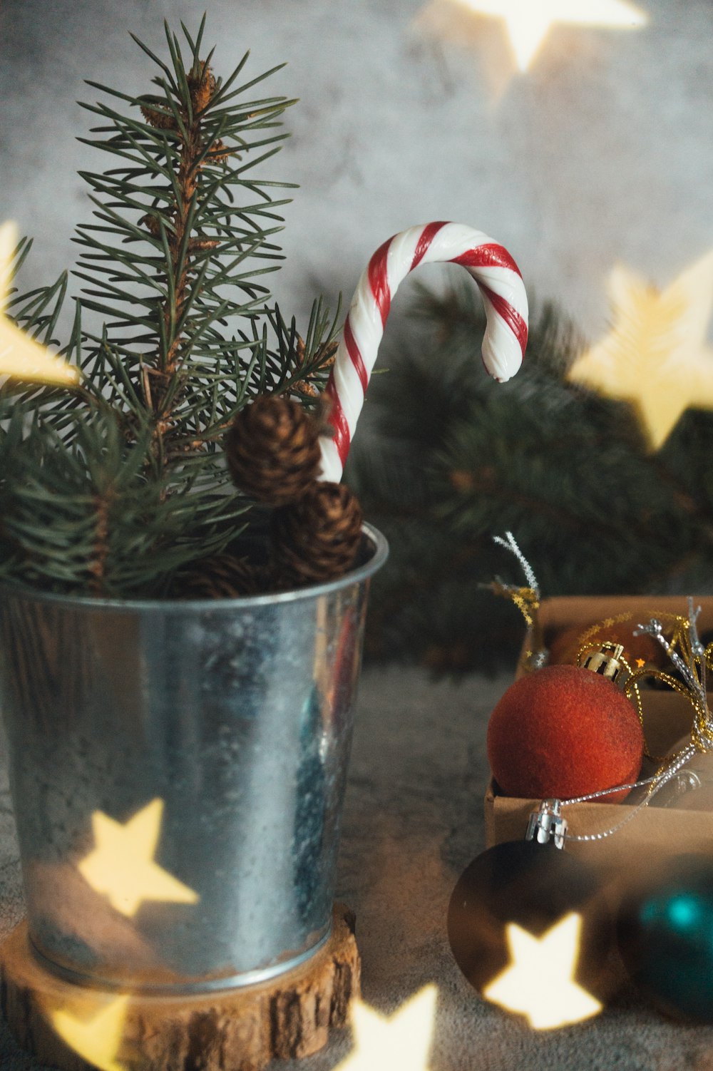 red and white candy cane on stainless steel bucket