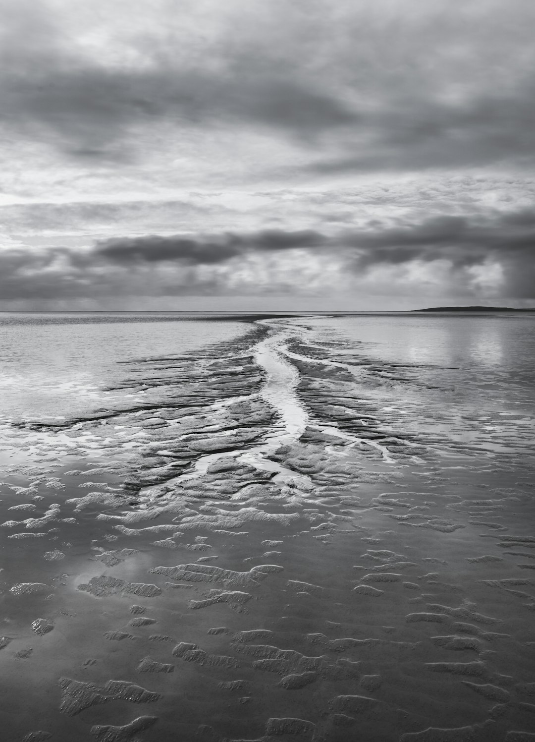 grayscale photo of water waves