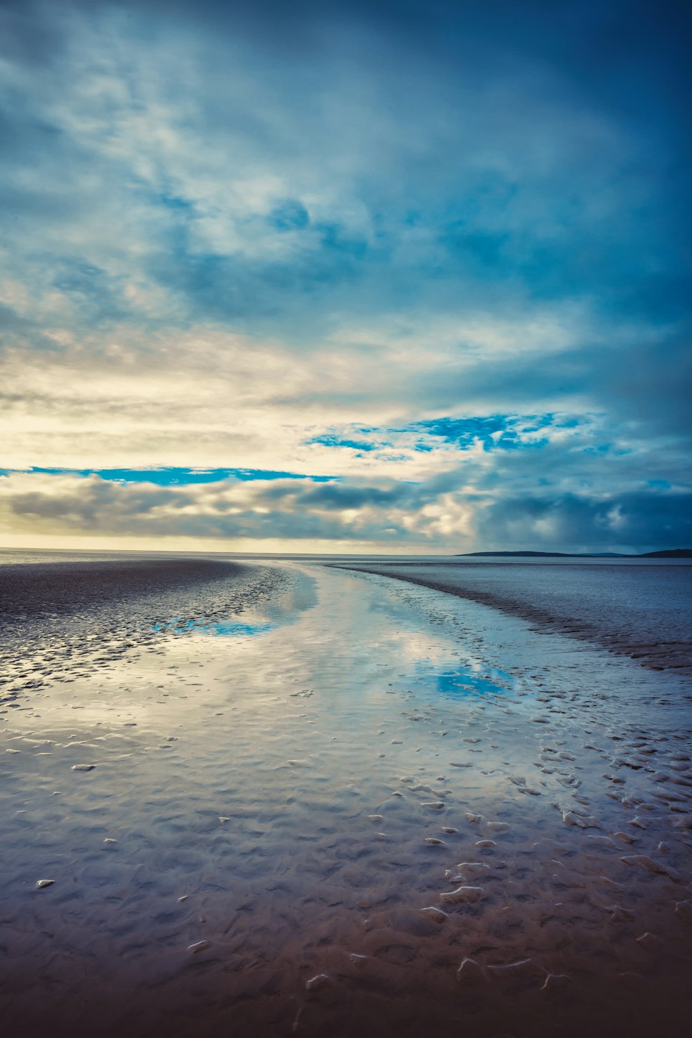 blue sky and white clouds over the sea