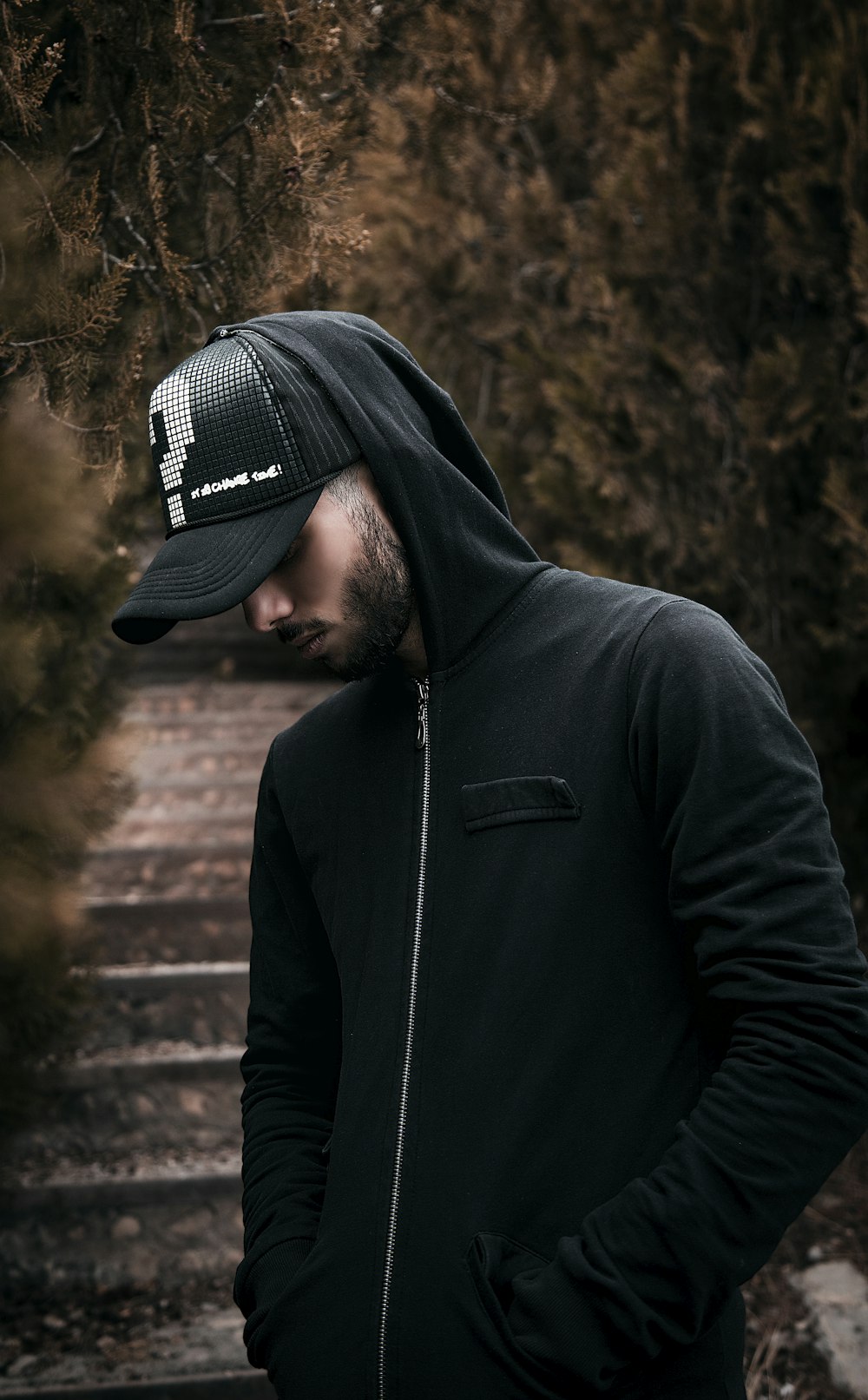 Man in black hoodie wearing black knit cap photo – Free Hoodie Image on  Unsplash