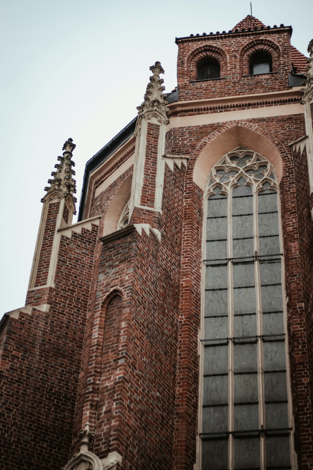 brown brick building with glass windows