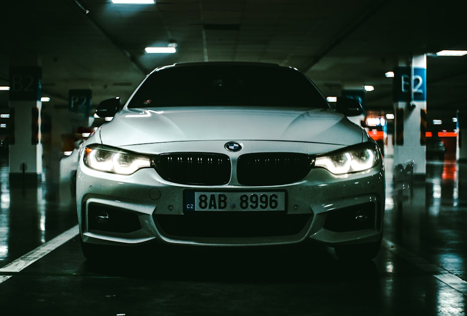 silver bmw car in a parking lot
