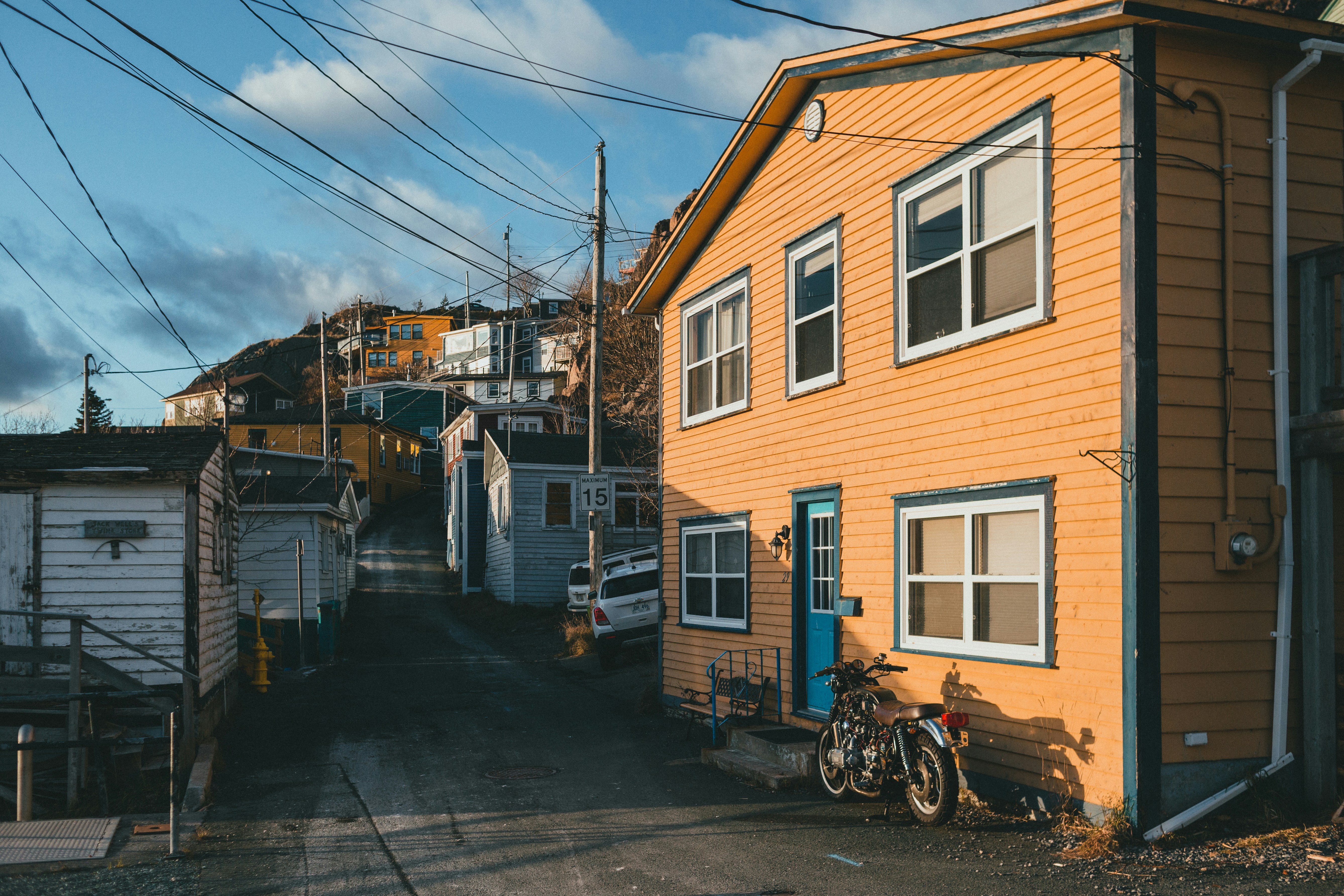 brown brick house beside river, 