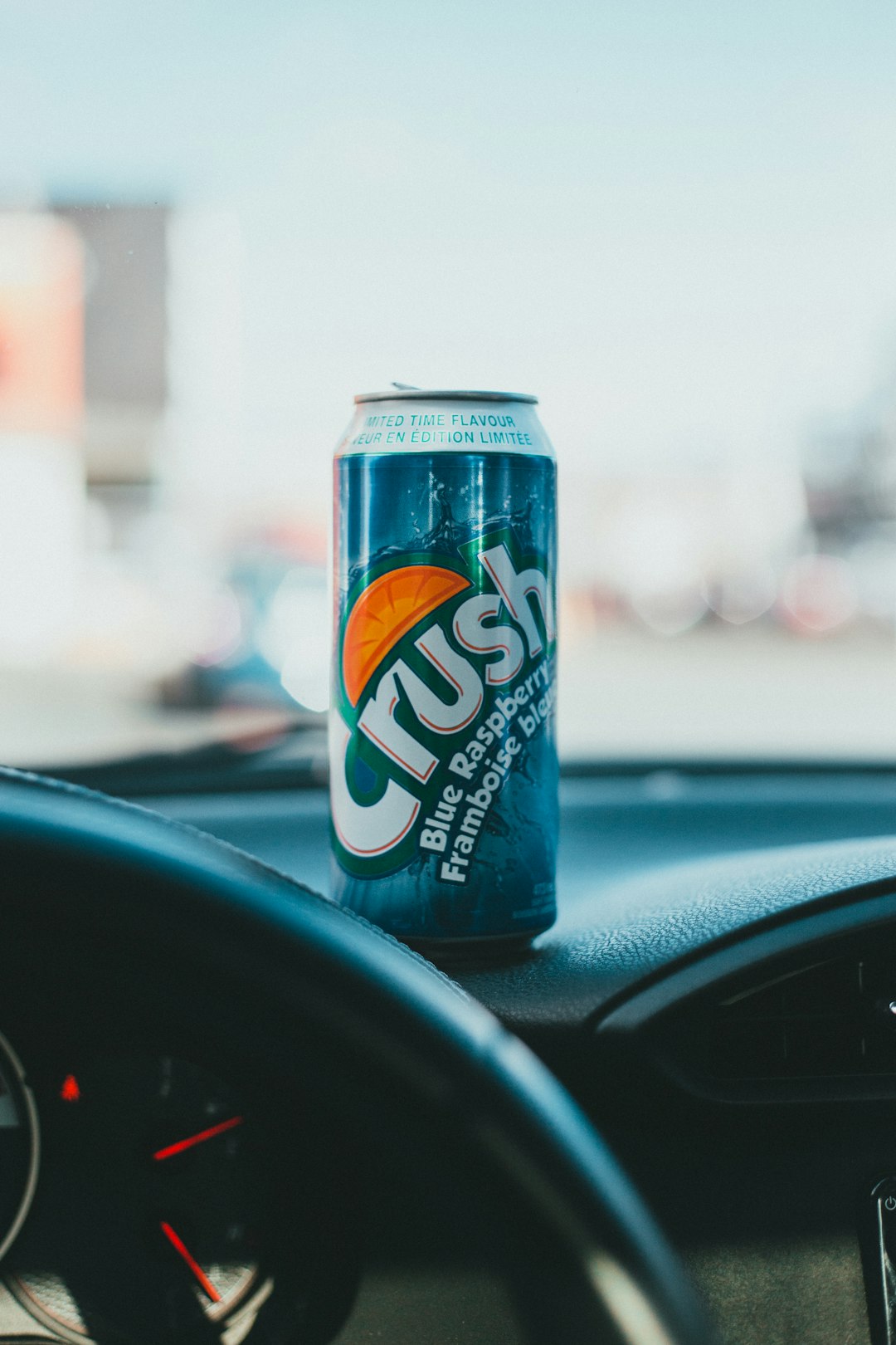 sprite can on car steering wheel