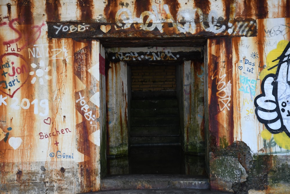 brown wooden door with brown and white wall