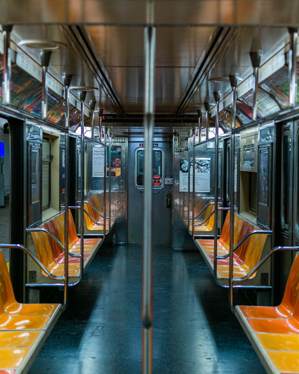gray and yellow train seats