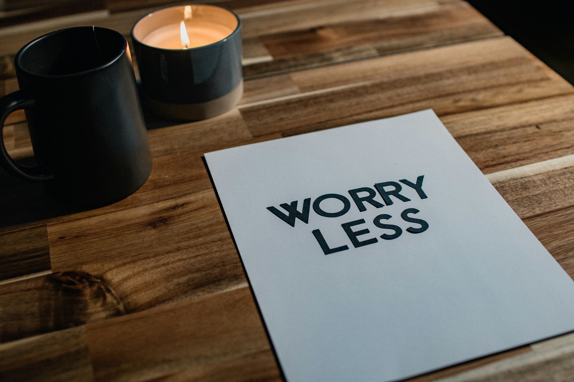 Worry Less message on a wooden table
