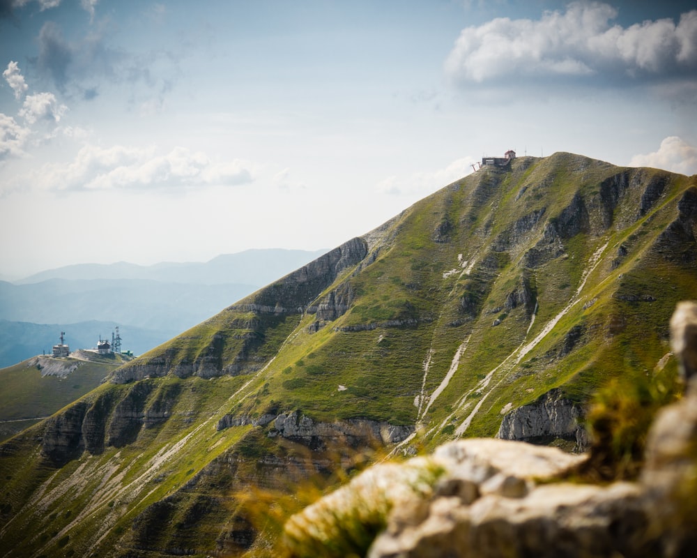 green and brown mountain under blue sky during daytime