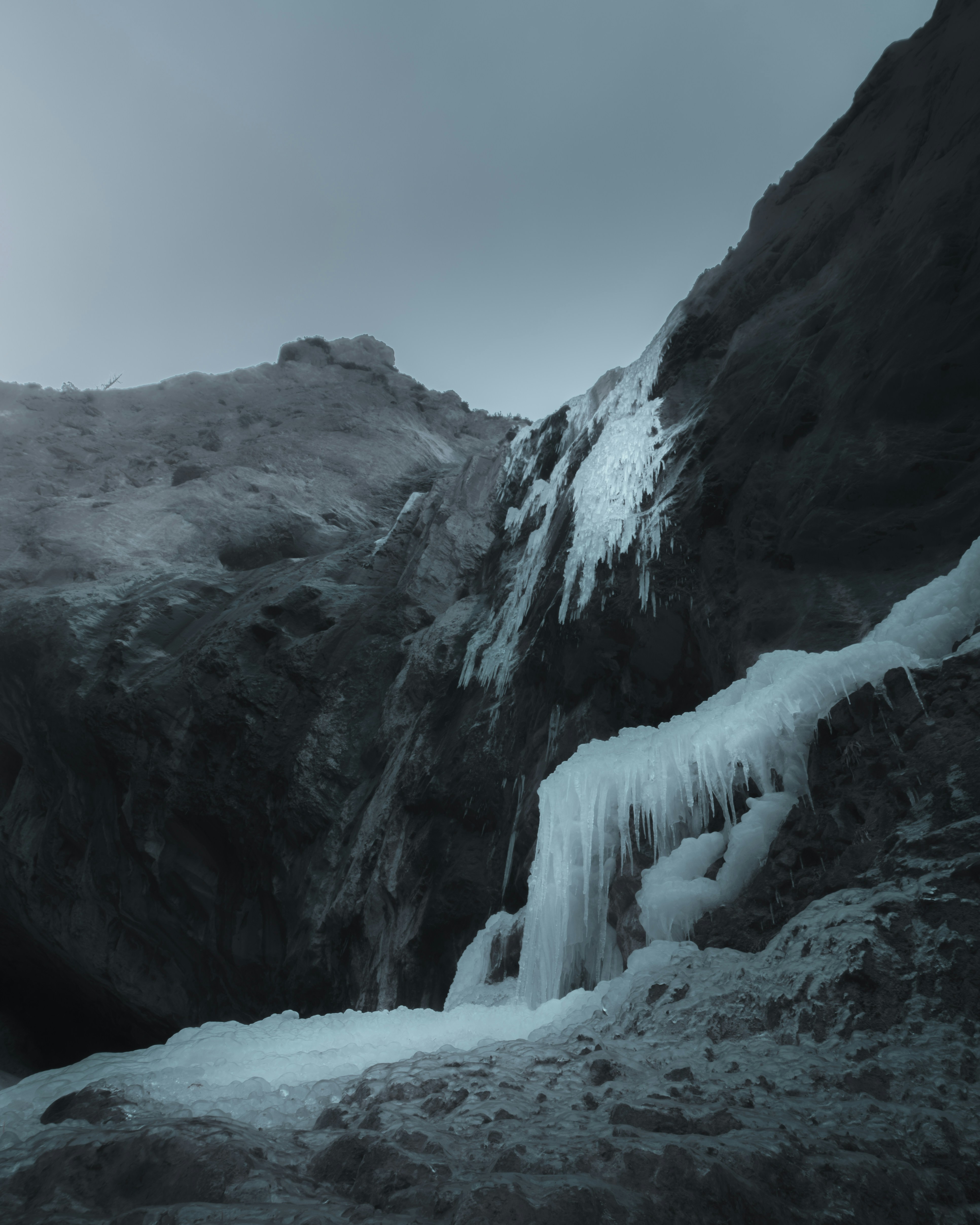 water falls on rocky mountain