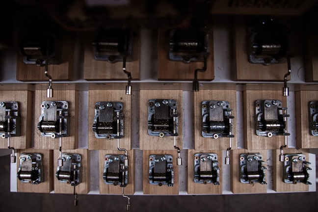 Close-up of a vintage-style wooden music box with intricate carvings.