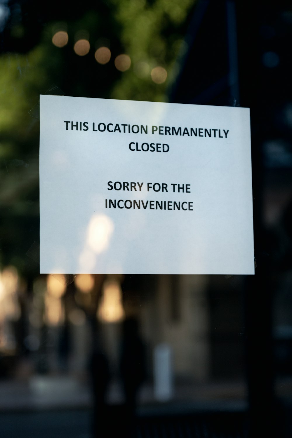 a close up of a sign on a glass door