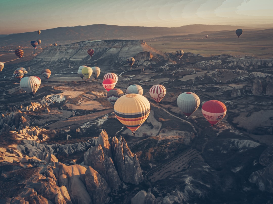 hot air balloons on the top of the mountain