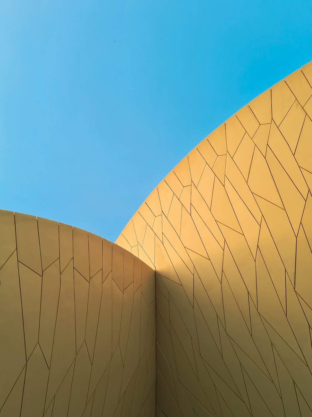 white concrete building under blue sky during daytime