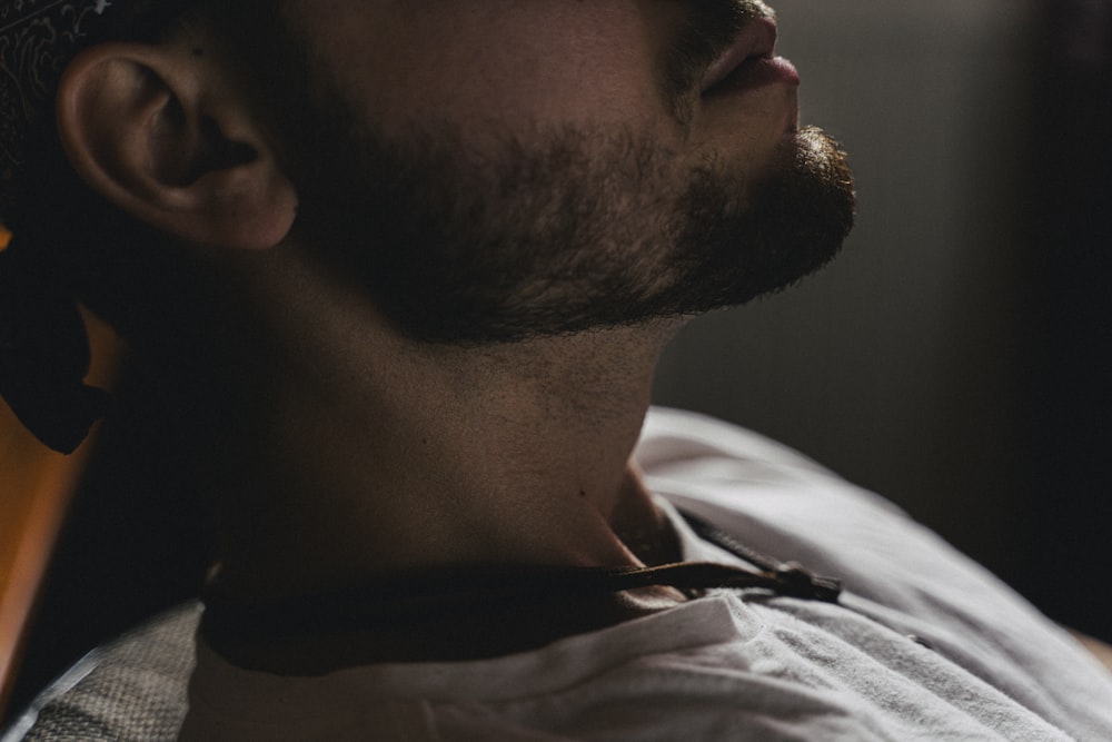 man in white crew neck shirt