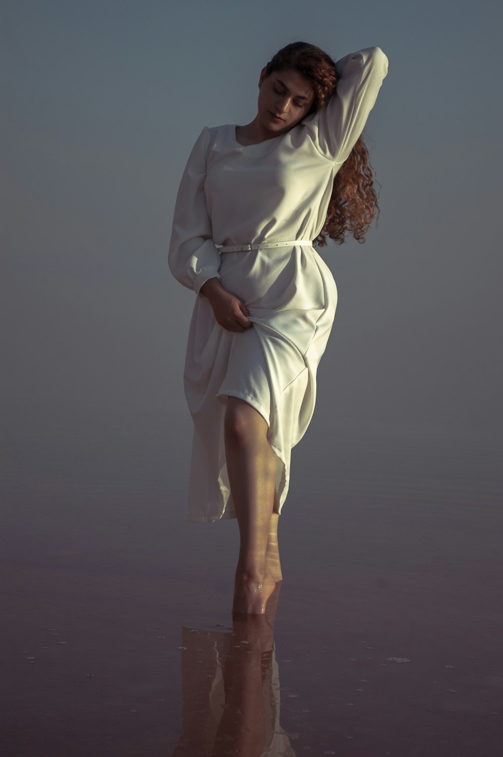 woman in white long sleeve dress