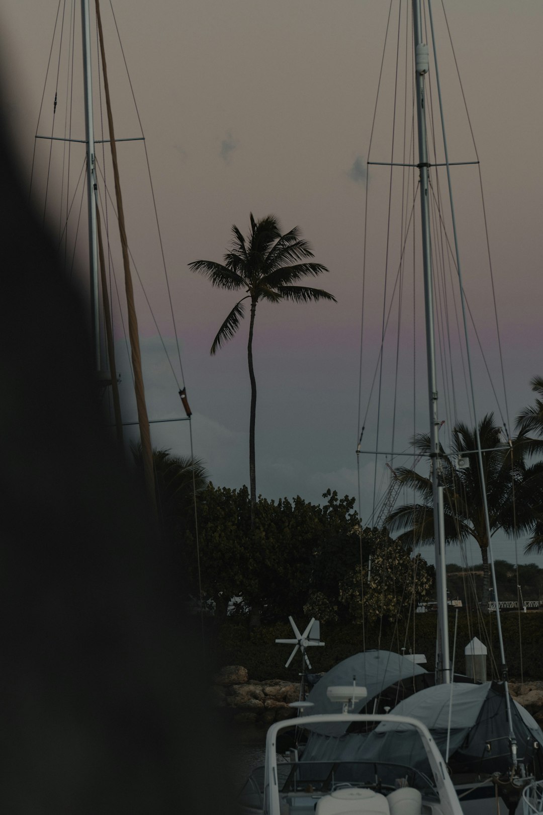 white sail boat on body of water during daytime