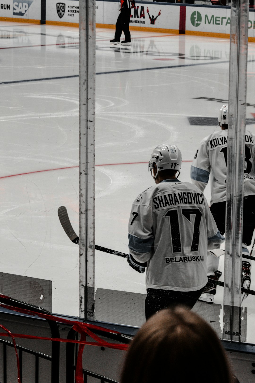 man in white and black ice hockey jersey shirt