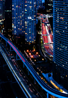cars on road in city during night time