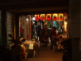 people sitting on chair in restaurant during night time