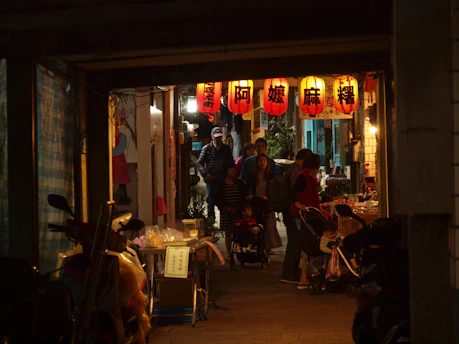 people sitting on chair in restaurant during night time