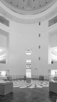 Contemporary showroom space featuring minimalist design and polished floors.