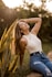 woman in white tank top and blue denim shorts