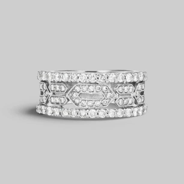 Elegant silver and platinum rings stacked together, highlighting their shine and craftsmanship