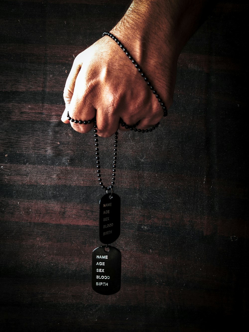 person holding black samsung remote control