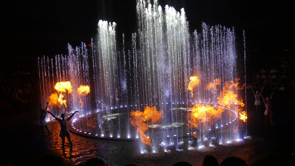 water fountain with fire during night time