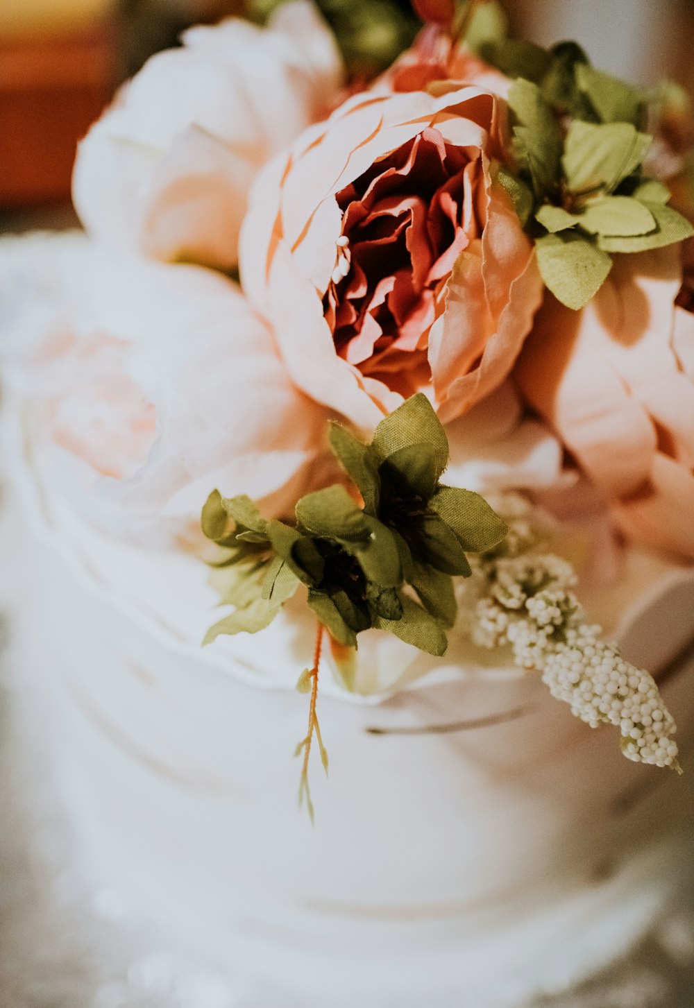 pink roses on white textile