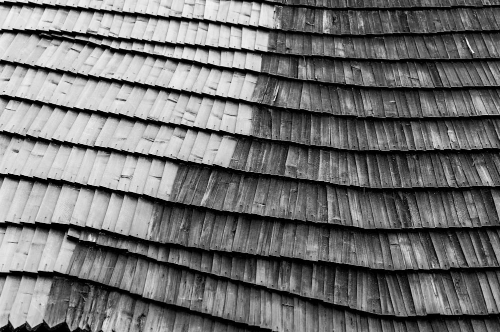 brown wooden plank in grayscale photography