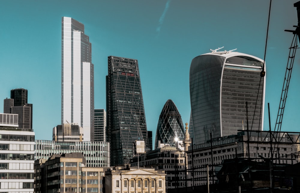 city buildings under blue sky during daytime