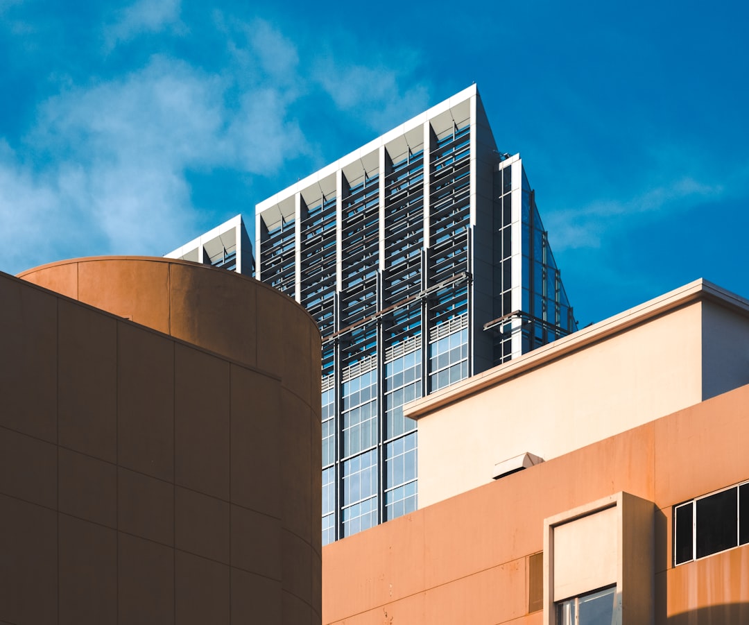 brown concrete building under blue sky during daytime